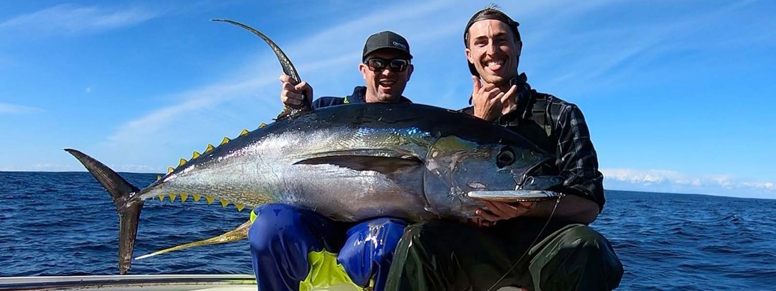 two guys with a big yellowfin tuna